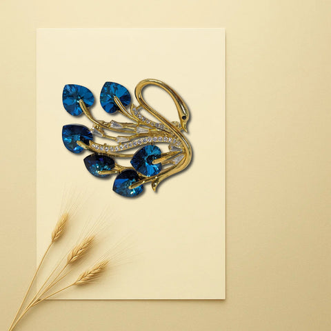 Majestic Peacock Brooch – Gold-Tone with Blue Heart-Cut Crystals