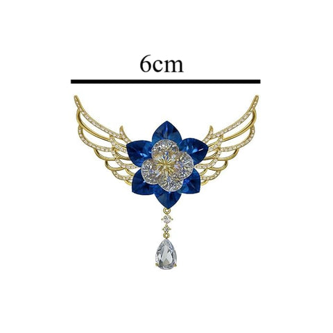 BRIA BY SAAR Blue Crystal Flower Brooch | Elegant Golden Wing Design with Dangling Teardrop Stone | Statement Fine Jewellery for Parties, Weddings & Festive Occasions