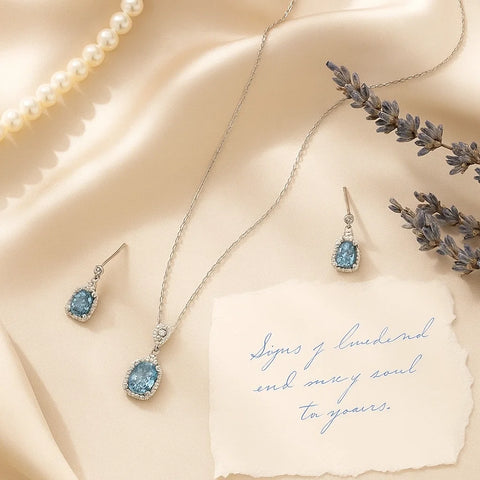 Elegant Silver Aquamarine Halo Jewelry Set – Pendant & Earrings