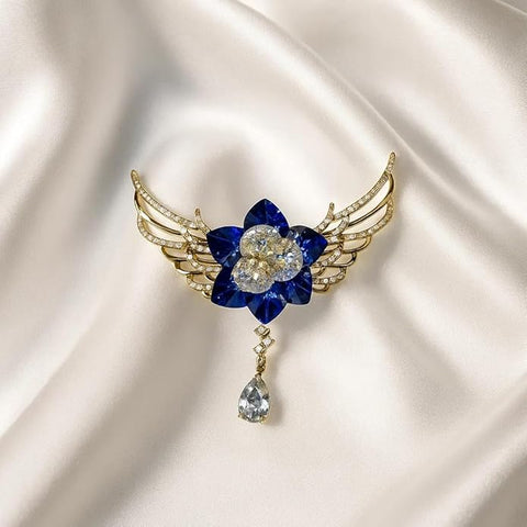 BRIA BY SAAR Blue Crystal Flower Brooch | Elegant Golden Wing Design with Dangling Teardrop Stone | Statement Fine Jewellery for Parties, Weddings & Festive Occasions