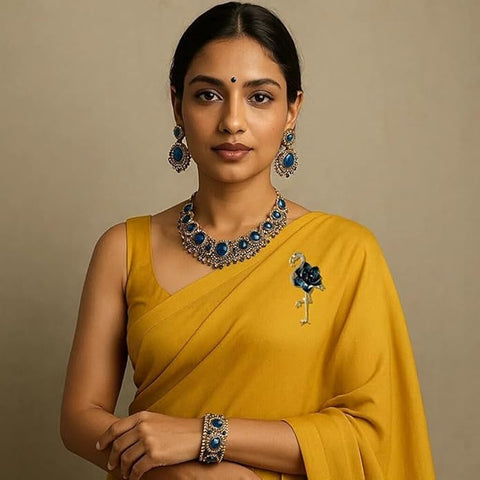 BRIA BY SAAR Flamingo Bird Swarovski Glass Brooch with Dark Blue Crystal Stones | Elegant Golden Finish Designer Pin for Women | Statement Jewellery for Saree, Blazer, and Gown | Wedding & Festive Gift