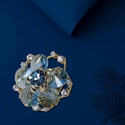 BRIA BY SAAR Swarovski Glass Flower Brooch for Women | Brilliant Blue Crystal Petals with Golden Finish | Elegant Rhinestone Accented Jewelry Pin for Weddings, Parties, and Festive Wear