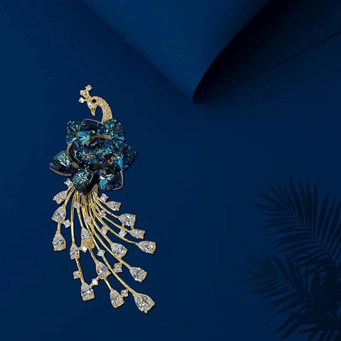 Elegant Swarovski Glass Peacock Brooch with Blue Crystal Floral Body & Cascading Diamond-Style Tail – Elegant Golden Finish Jewelry Pin for Women’s Party, Wedding