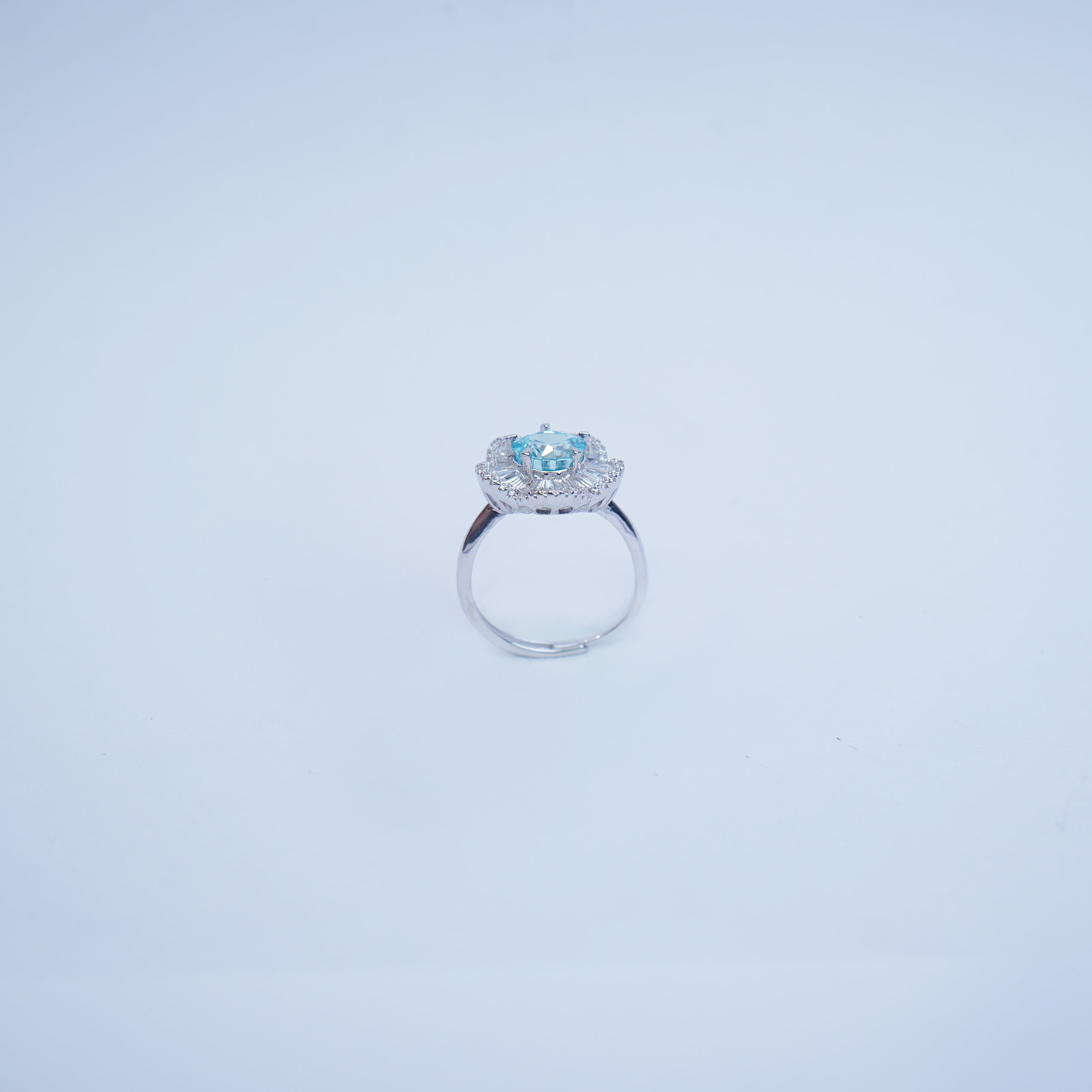 Elegant Silver Halo Ring with Blue Aquamarine Center Stone